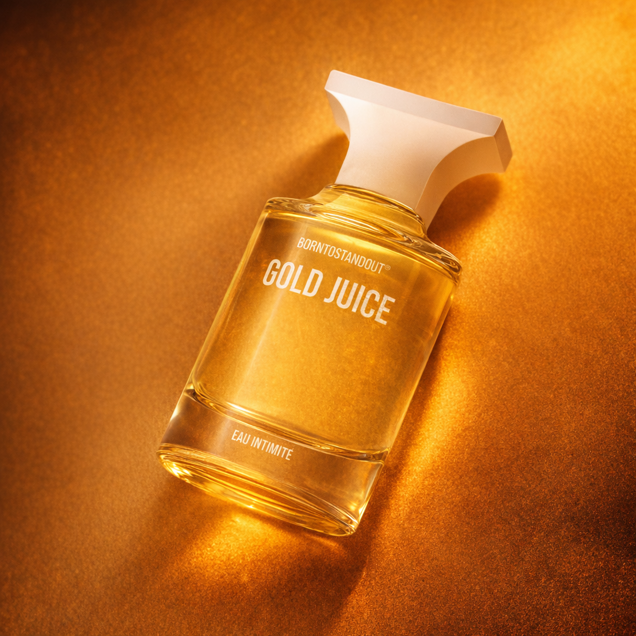 BORNTOSTANDOUT Gold Juice Eau Intimite angled still-life gallery showcase